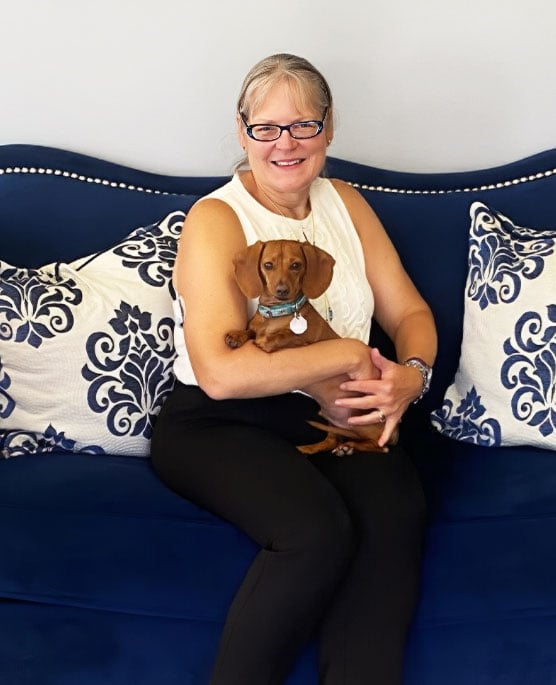 Rhonda J. Magnussen with her dog